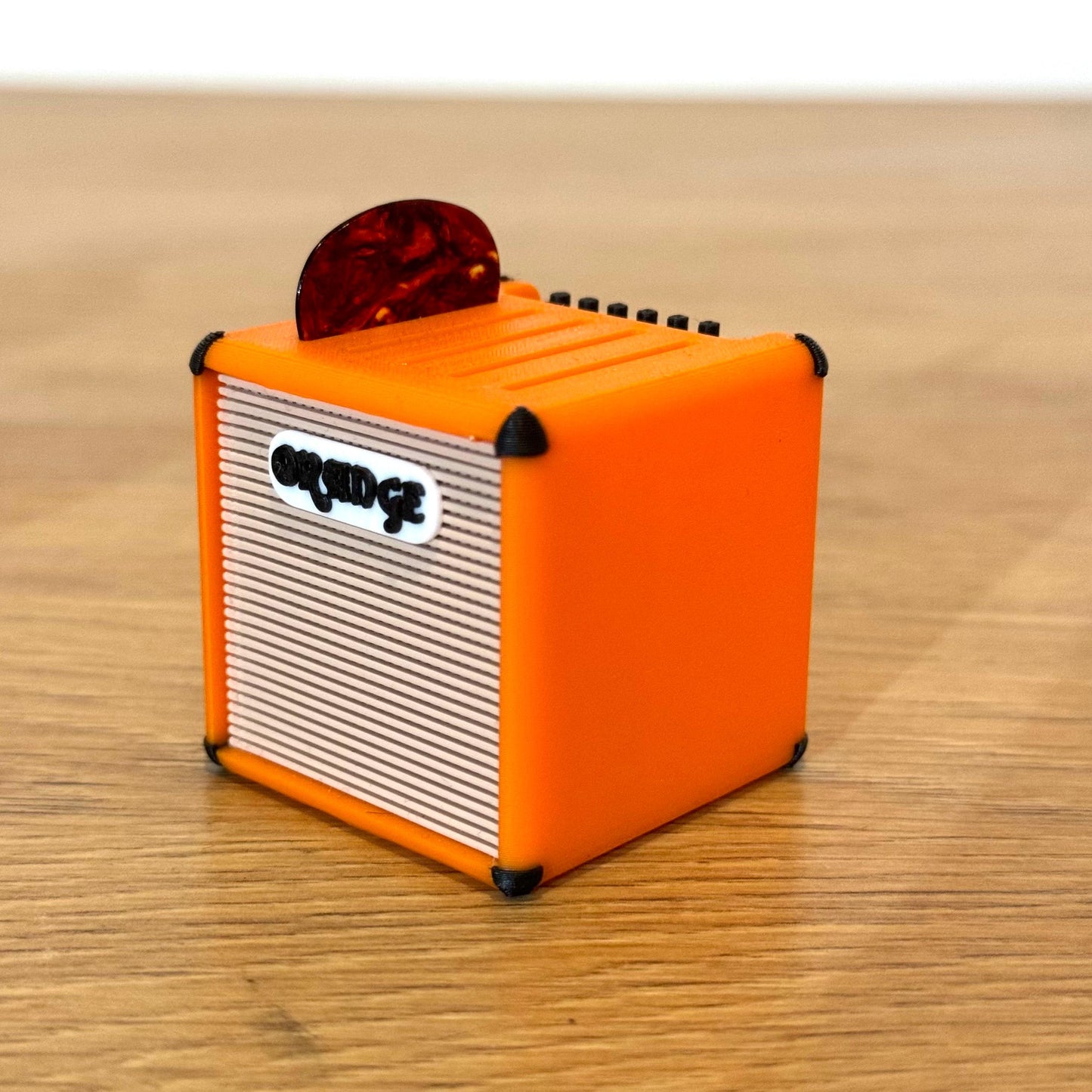 Mini gitarforsterker-plekterholder