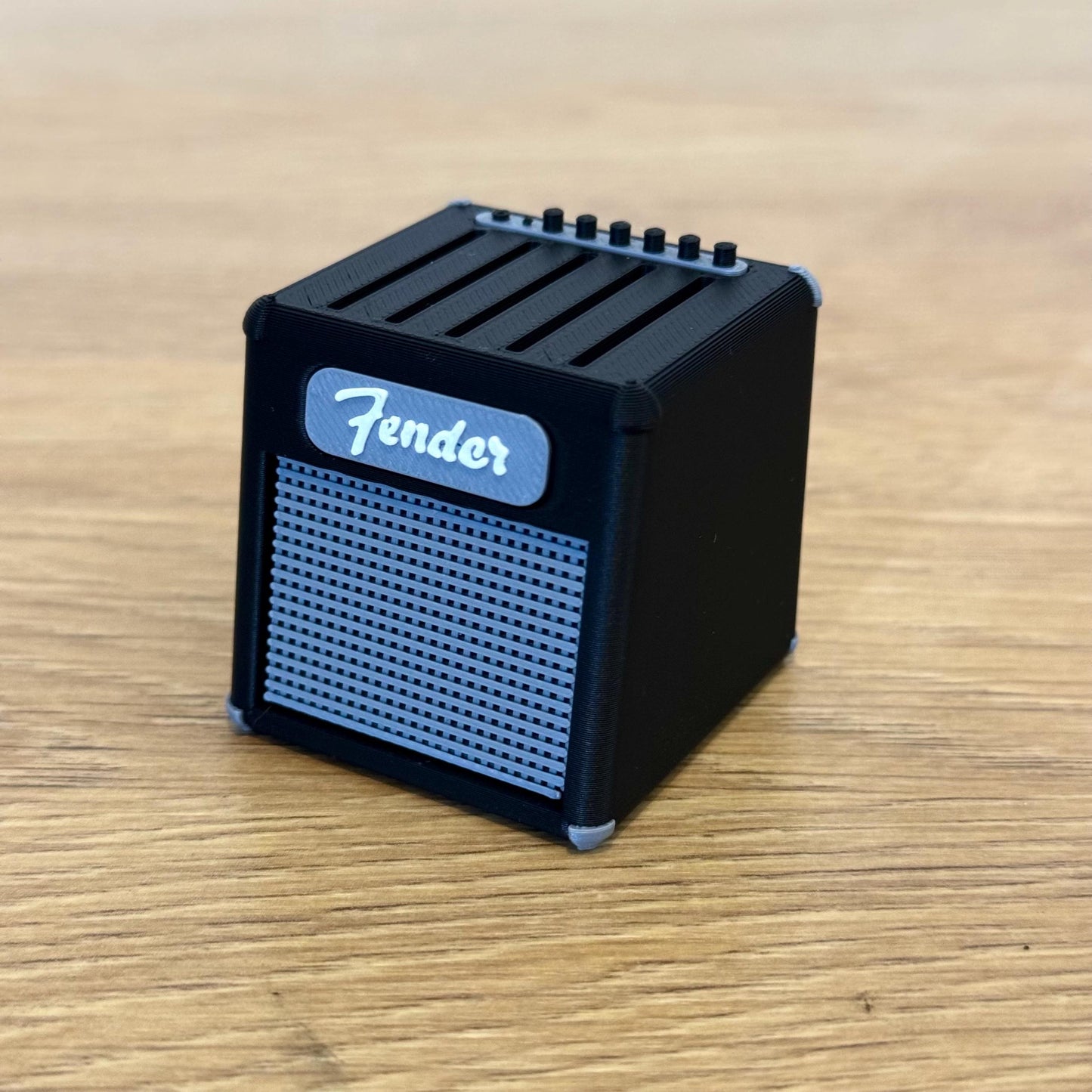Mini gitarforsterker-plekterholder